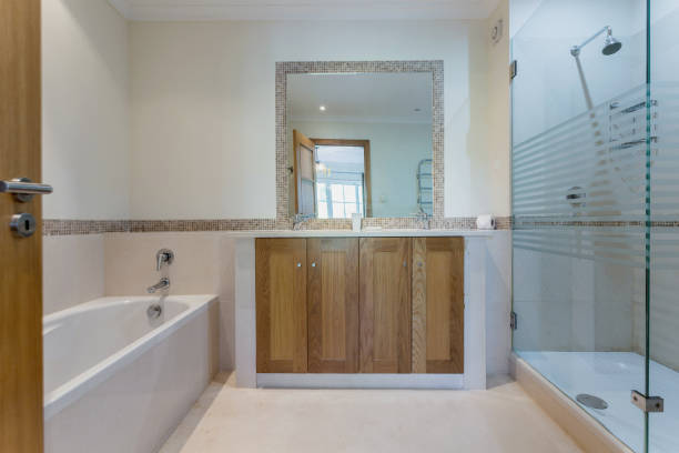 istock Modern bathroom with shower and mirror. European hotel design. 1305941942