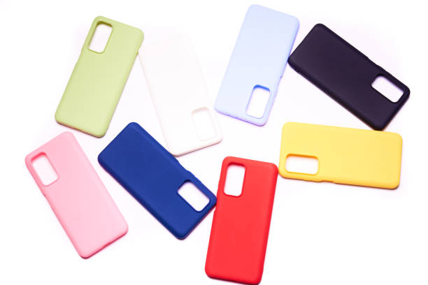 istock Colorful plastic back covers for mobile phones on white background. mobile phone protection. copy space 1305947029