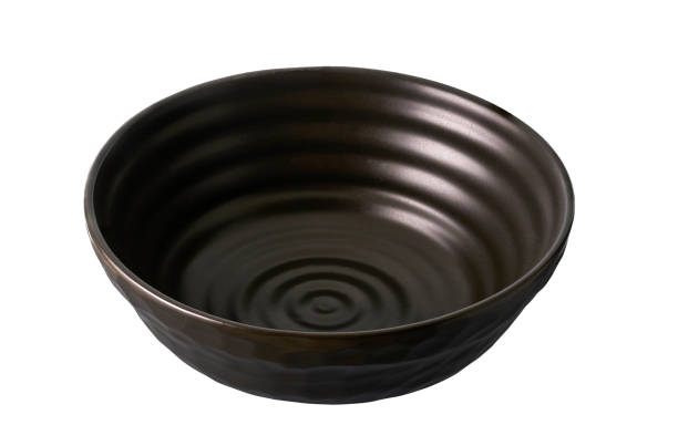 istock Dark brown ceramic bowl, Empty black bowl with rough texture isolated on white background with clipping path, Side view 1305948698