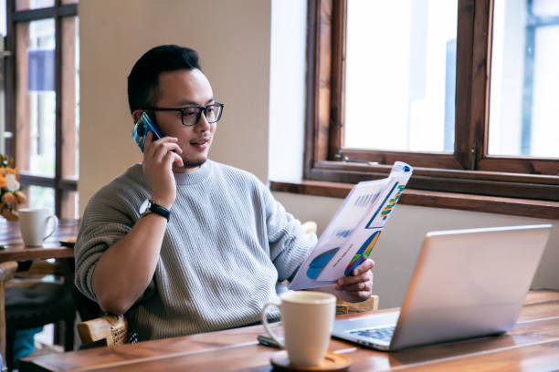 istock businessman talking on the phone 1305948709