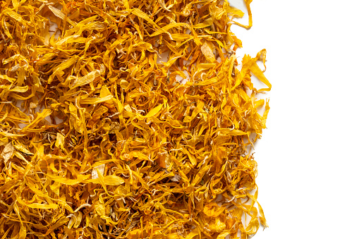 Calendula flower dried petals healthy for tea infusion helps digestive system isolated on white background, Calendula officinalis