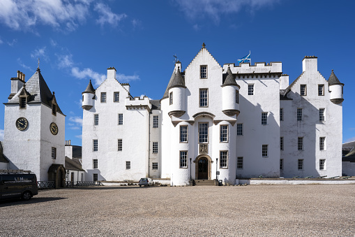 Perthshire, Scotland - May 24 , 2019 : White elegant Blair Castle locates near the village of Blair Atholl , one of the most tourist attractions in Scottish Highlands