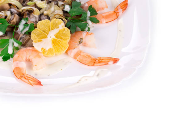 Cajun Jumbo Shrimp and Grits on a plate with savory sauce