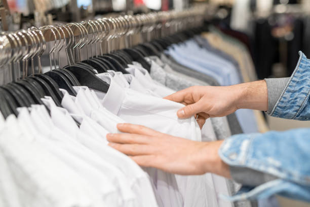 istock Choosing shirt in the store 1305951342