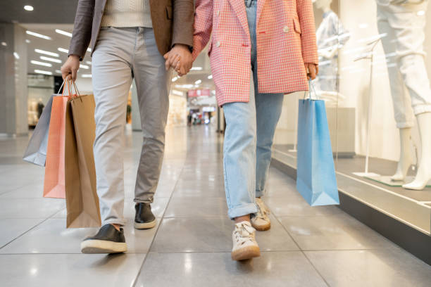istock Couple with purchases in the store 1305951360