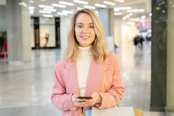 istock Woman doing shopping in the mall 1305951386