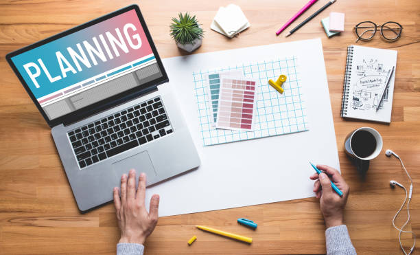 istock Planning concepts with top view of person work on desk table 1305951534