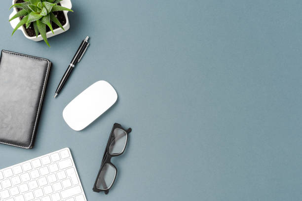 istock Overhead shot of business desktop with computer 1305951594