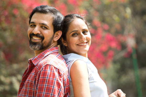 istock Loving couple spending leisure time at park 1305955601
