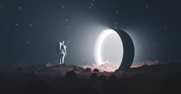 istock Astronaut on foreign planet in front of spacetime portal light 1305960647