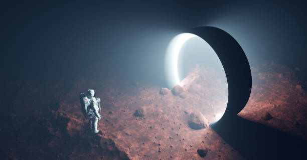 istock Astronaut on foreign planet in front of spacetime portal light 1305960662