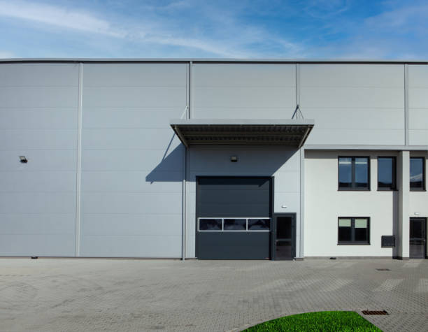 istock Rolling gate or roller shutter used for factory, warehouse or hangar. 1305961742