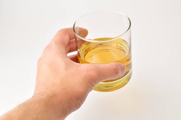 Whiskey glass in hand
