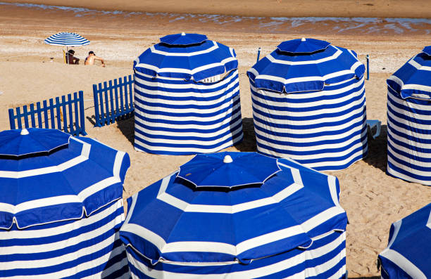 istock beach tents of cabourg 1305964751