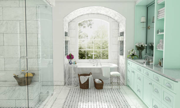 This modern bathroom has a sunken tub, glass door shower, with tile floors and walls. 