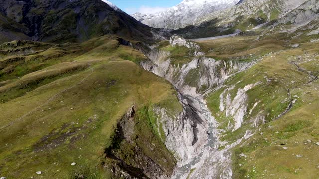 Aerial view of deep river gorge on the Greina Plains in Switzerland