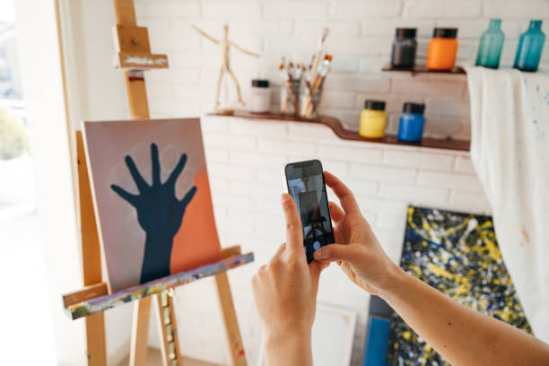 istock Artist taking a picture of her 