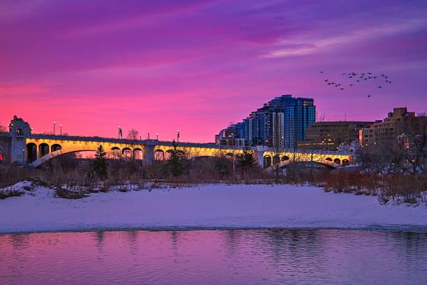 istock Sunrise Sky Glowing Over An Illuminated City Bridge 1305974156