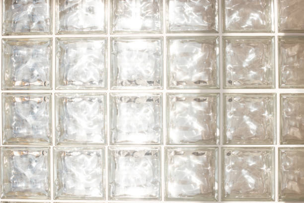 istock White glass brick wall - seamless texture. Close up 1305974434