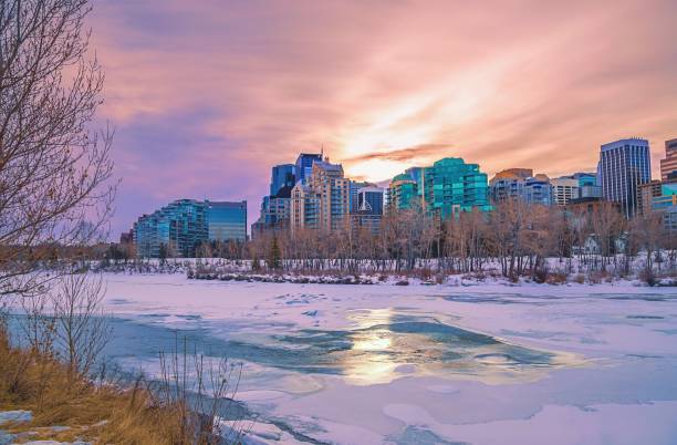 istock Sunrise Clouds Over A Frozen Calgary River 1305974487