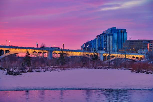 istock Sunrise Sky Glowing Over An Illuminated City Bridge 1305974601