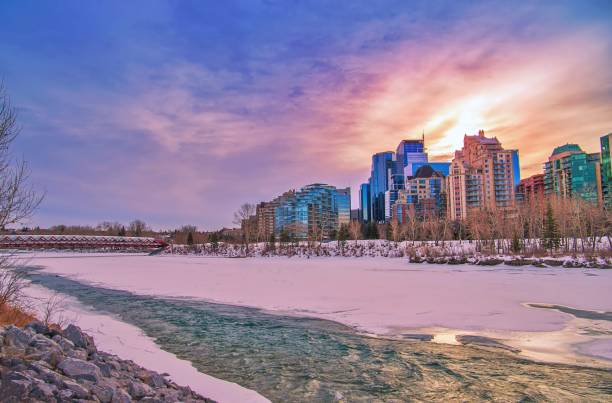 istock Sunrise Clouds Over A Frozen Calgary River 1305974662