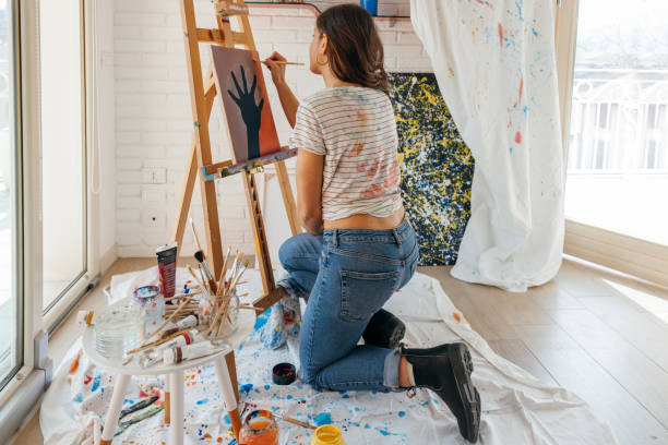 istock Artist working on her new drawing in home studio 1305975611