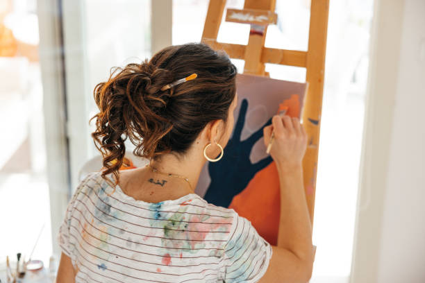 istock Artist working on her new drawing in home studio 1305977438