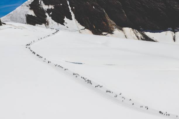 istock Swiss mountains with people 1305977759