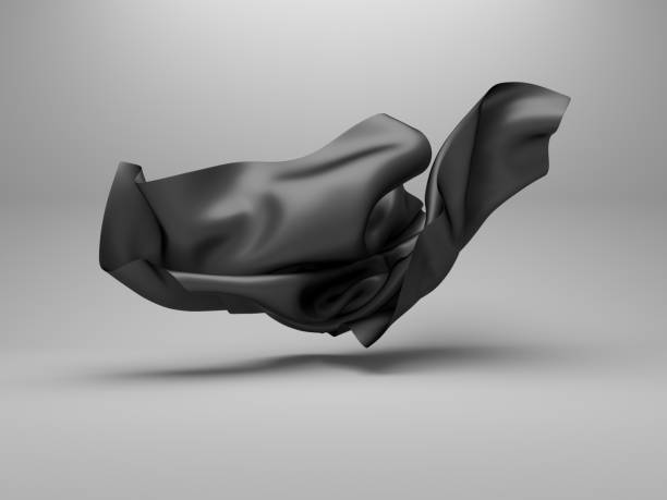 istock Wavy black satin fabric on a white background 1305983231