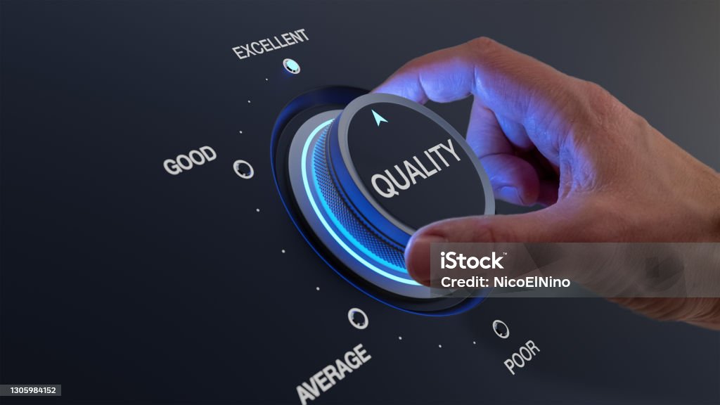 Selecting excellent quality to increase customer satisfaction. Quality assurance management and control for products or services. Concept with QA manager's hand turning knob. Quality Stock Photo