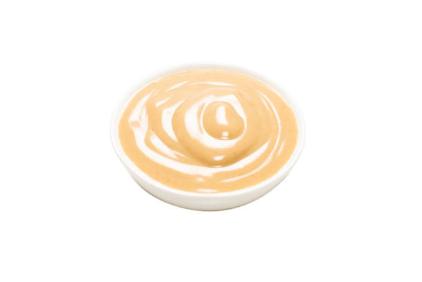 istock Mushroom sauce in a bowl isolated on white background. 1305984386