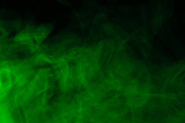 istock Green steam on a black background. 1305984444