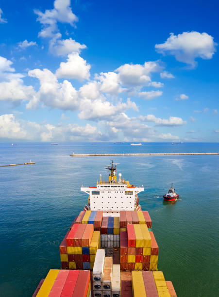 istock Aerial view of container freight ship carrying container box for import and export business logistic. 1305984716