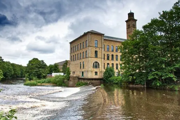 Saltaire former textile mill (Salts Mill) in Victorian model village in Shipley (England) listed as UNESCO World Heritage Site.