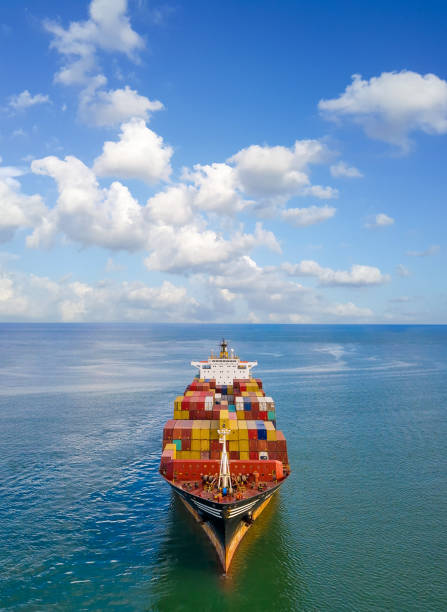 istock Aerial view of container freight ship carrying container box for import and export business logistic. 1305985921