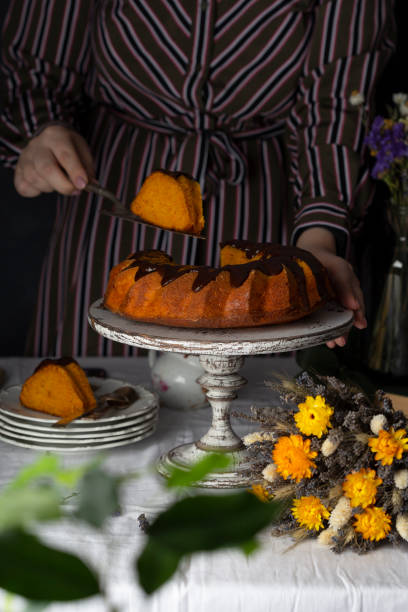 istock homemade carrot cake with chocolate and slice on the table 1305987700