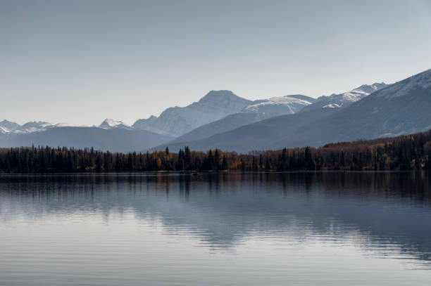 istock Pyramid lake with mountain range and clear sky reflection at Jasper national park 1305990555
