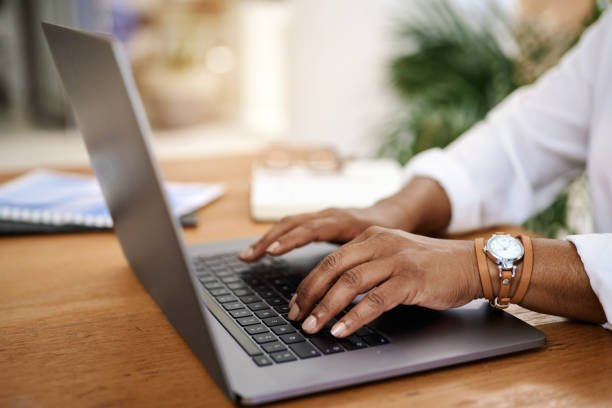 istock Responding in a timely manner to all her work emails 1305990638