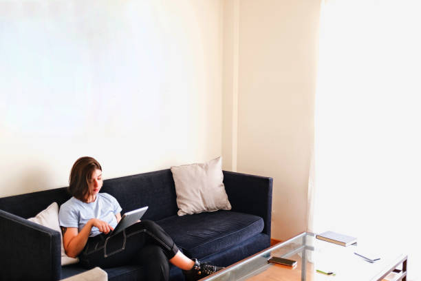 istock enterprising girl working from her tablet 1305991997