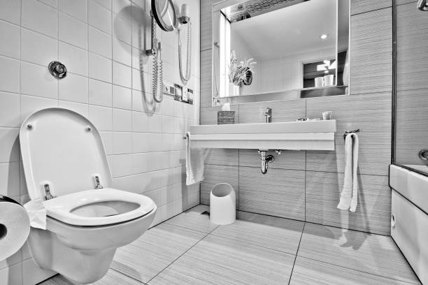 istock Modern bathroom with  toilet sink 1305992087