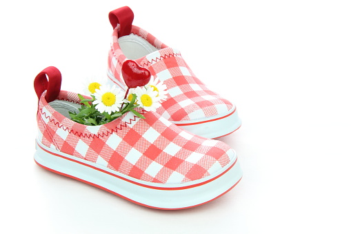 flower and heart and slip‐on shoes for children