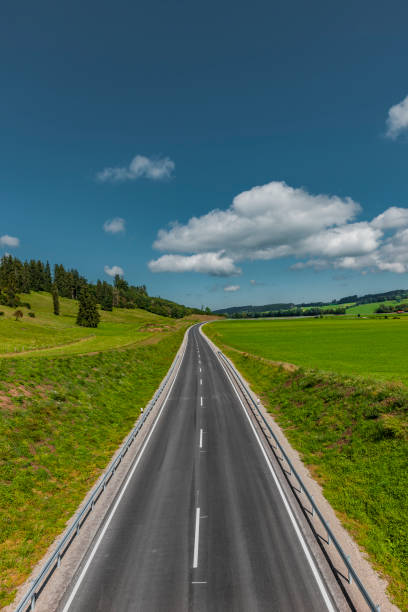 istock German Highway through green landscape 1305994874