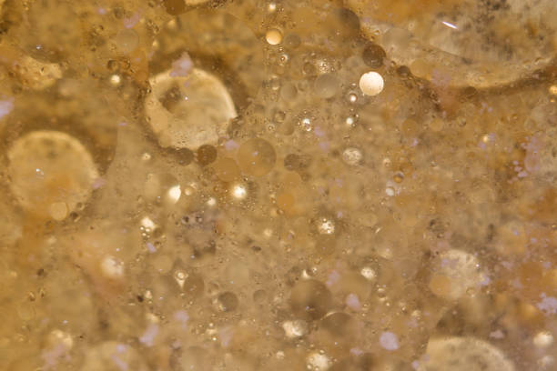 istock Abstract circles and brown spots out of focus. View from above. Copyspace 1305997396