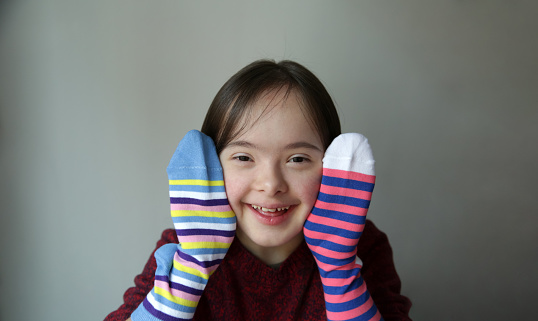 Beautiful girl with different socks
