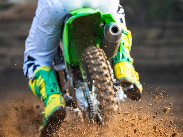 istock Motocross scene on a trail 1305998812