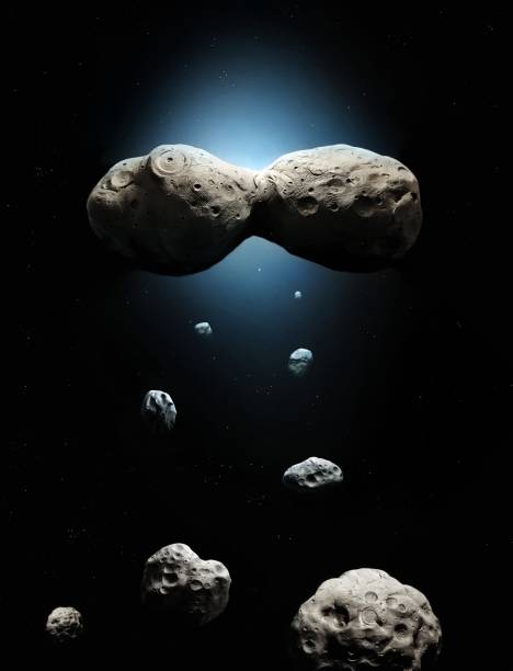 istock Asteroid belt in space with stars. Craters on the surface of large asteroids. 1305999527