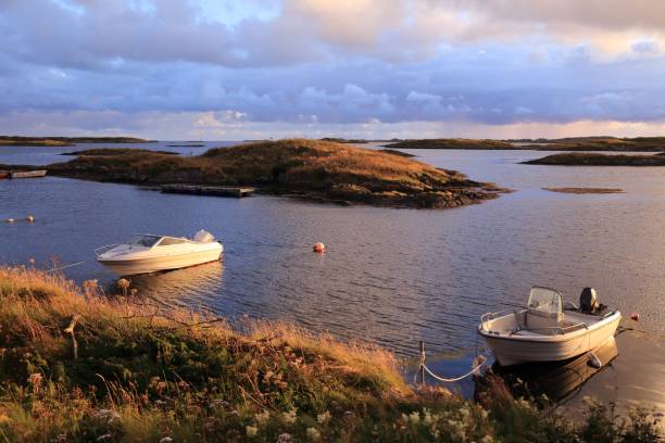 Fishing boats in Norway Norway coast in summer. Fishing harbor sunset at Karmoy island. haugaland photos stock pictures, royalty-free photos & images