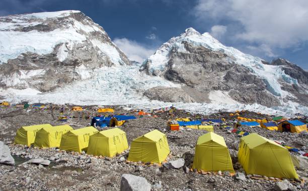 istock Mount Everest base camp yellow tents and prayer flags 1306002597