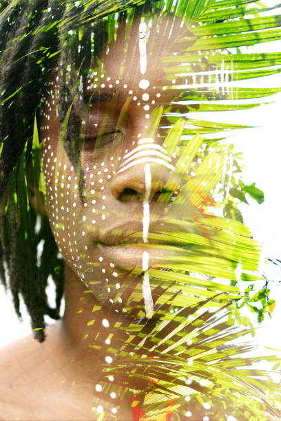 istock A double exposure portrait with ethnical face painting 1306002756